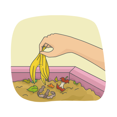 Une main jette une peau de banane